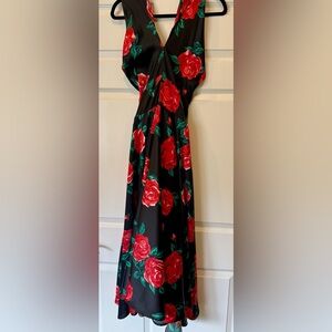 Pinup Couture Black Dress with Red Floral Design